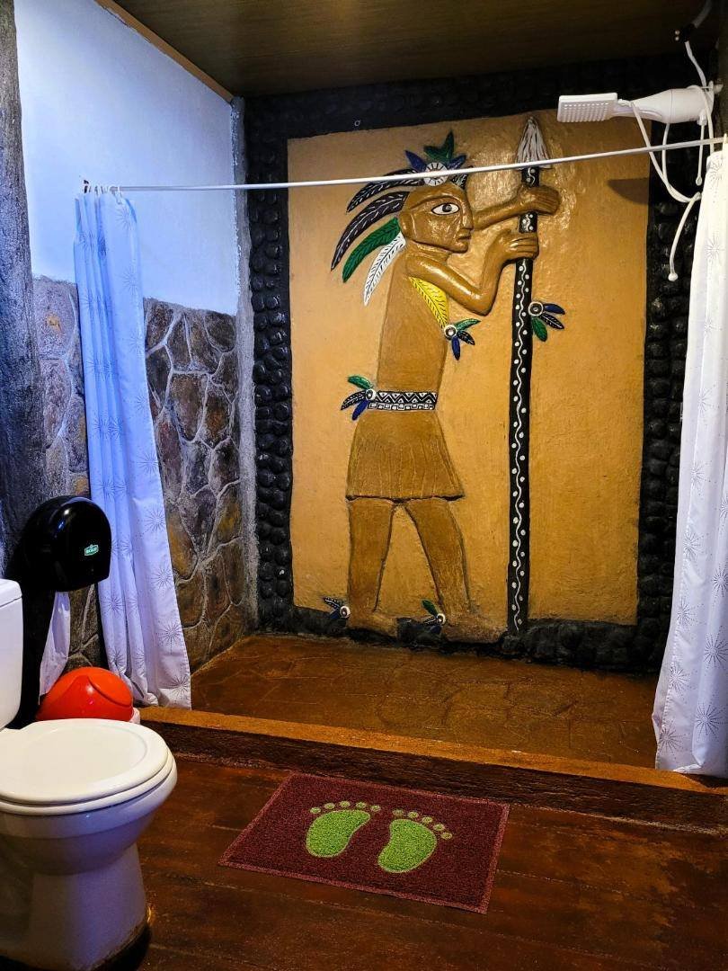 Bathroom with a hand-painted mural